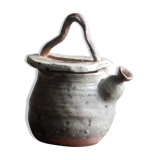 Homemade teapot in pyrity sandstone