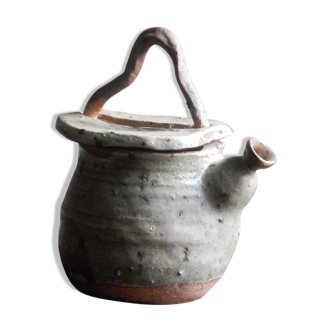 Homemade teapot in pyrity sandstone