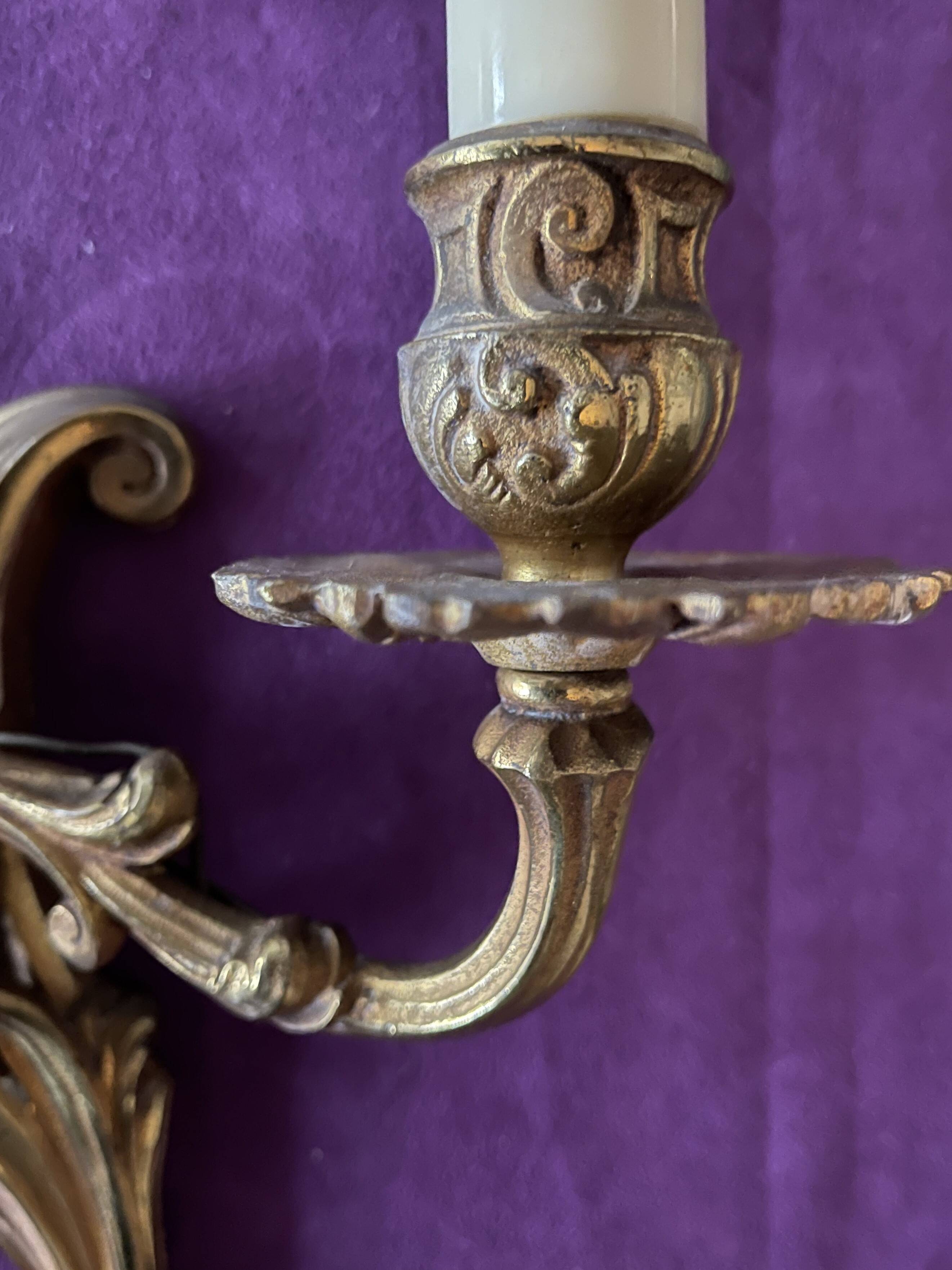 Pair of gilded bronze wall lights, 1950