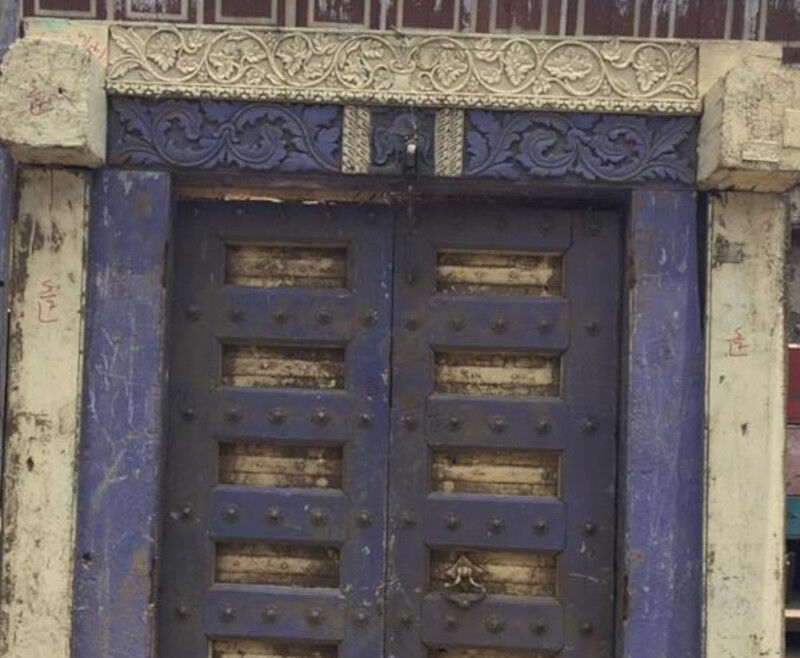 Old Indian door in old teak, piece and patina of origin