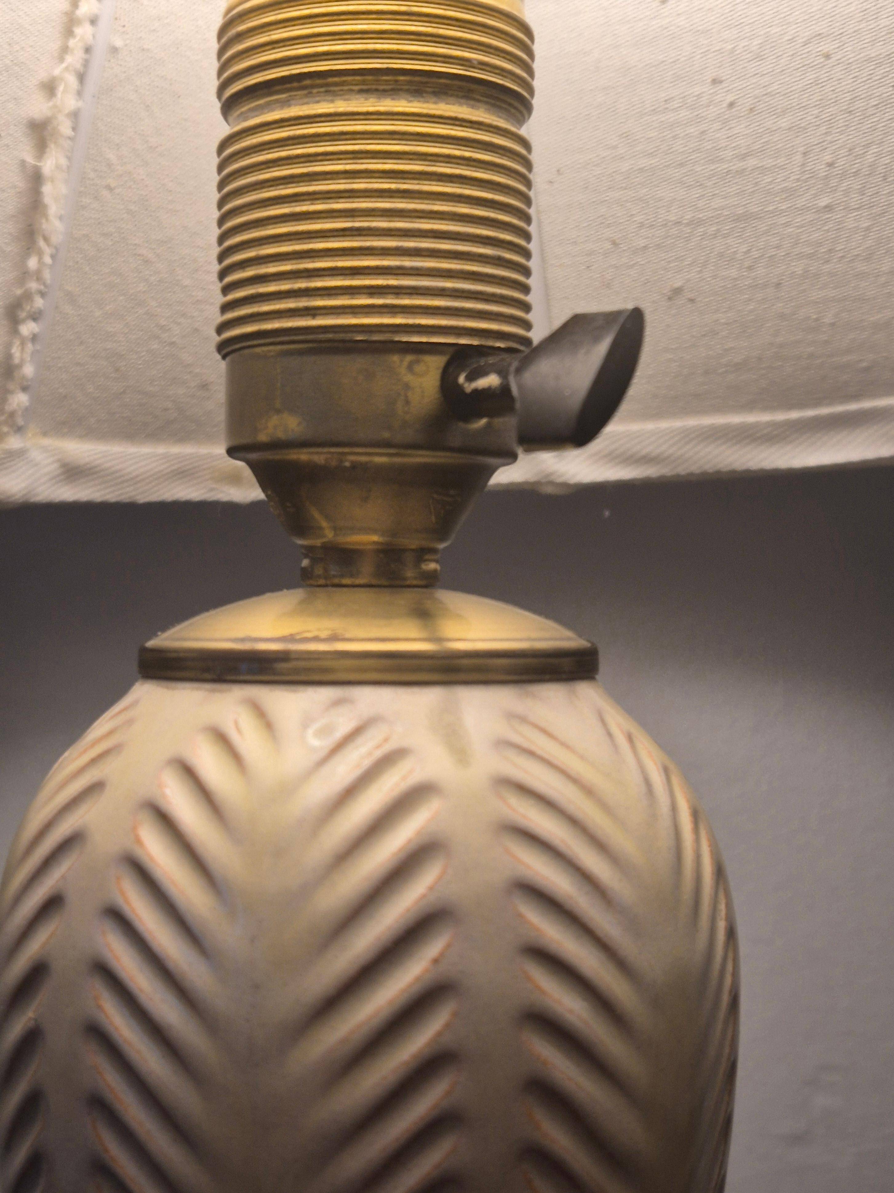 Modern Swedish table lamp with a ceramic base by Anna-Lisa Thomson, mid-1900s.