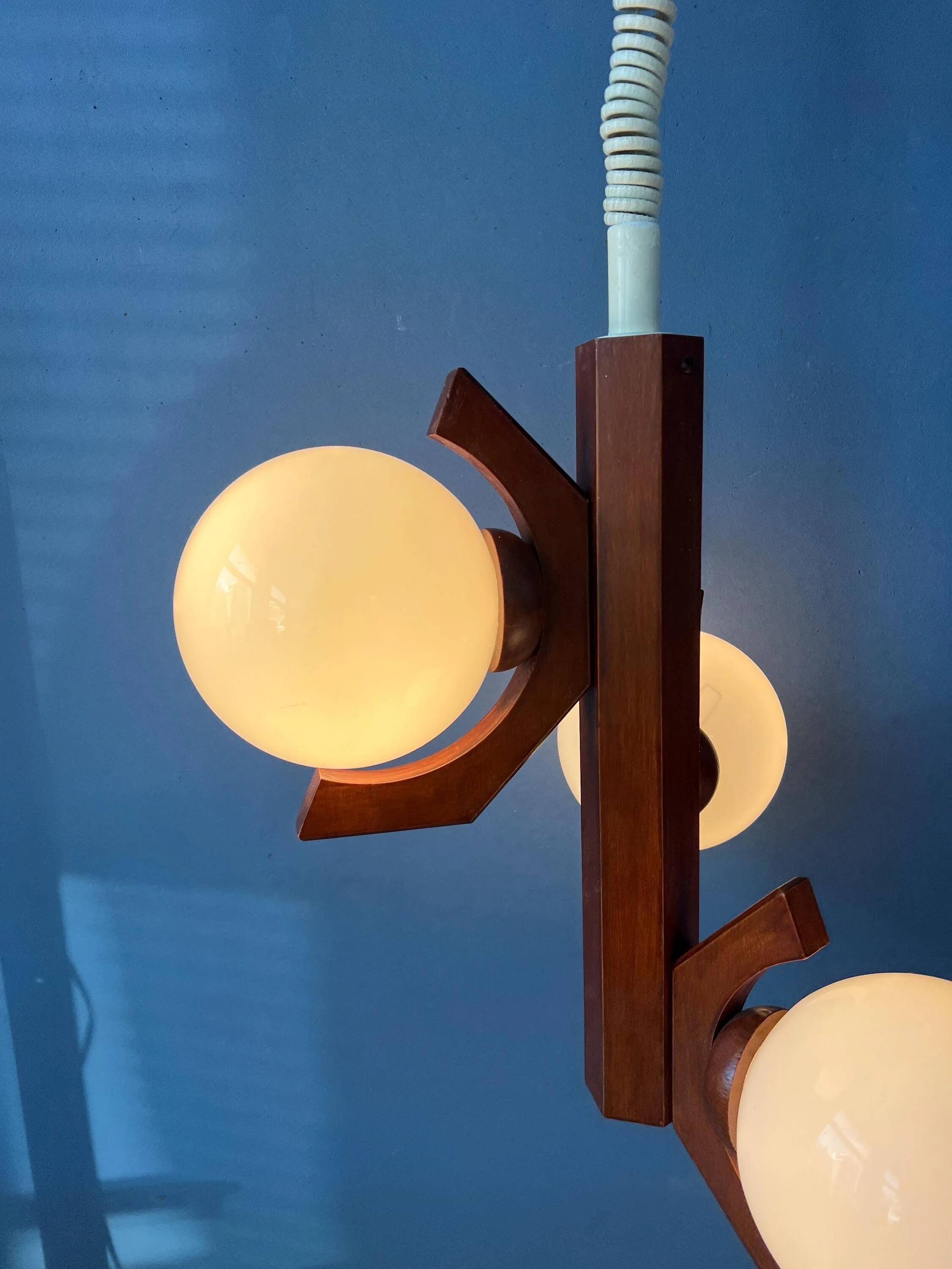 Mid-century brown Bony suspension with opaline glass shade.