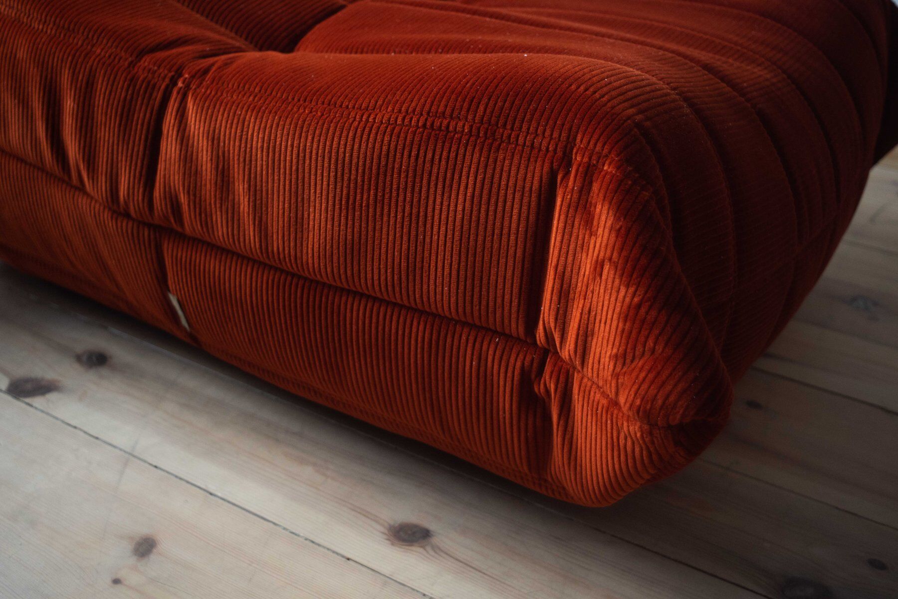 Amber corduroy Togo lounge chair with pouf and three-seat sofa by Michel Ducaroy for Ligne Roset, set of 3