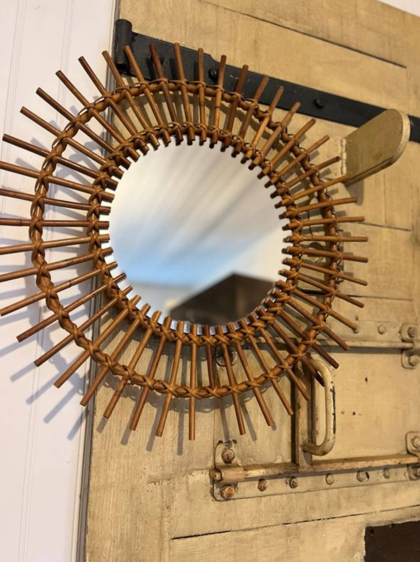 Round rattan mirror