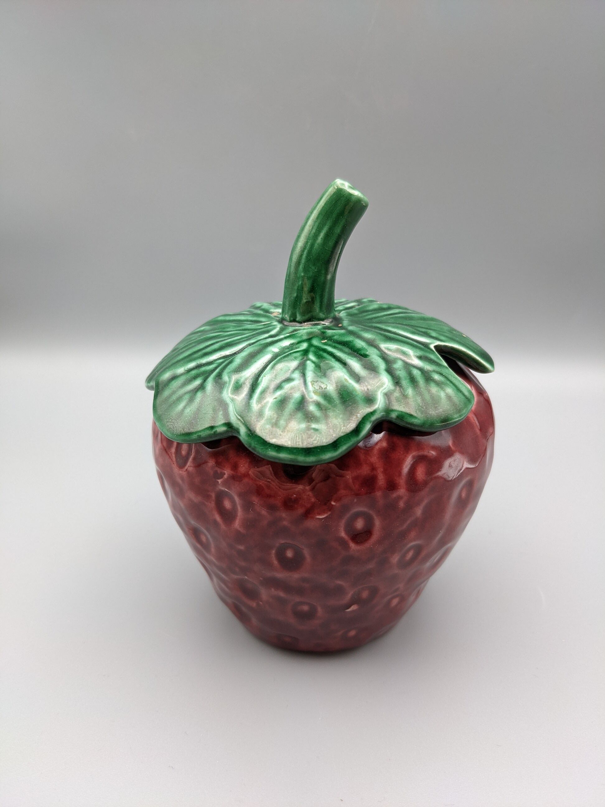 Condiment jar mustard jam in the shape of strawberry