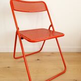 Perforated metal folding chair