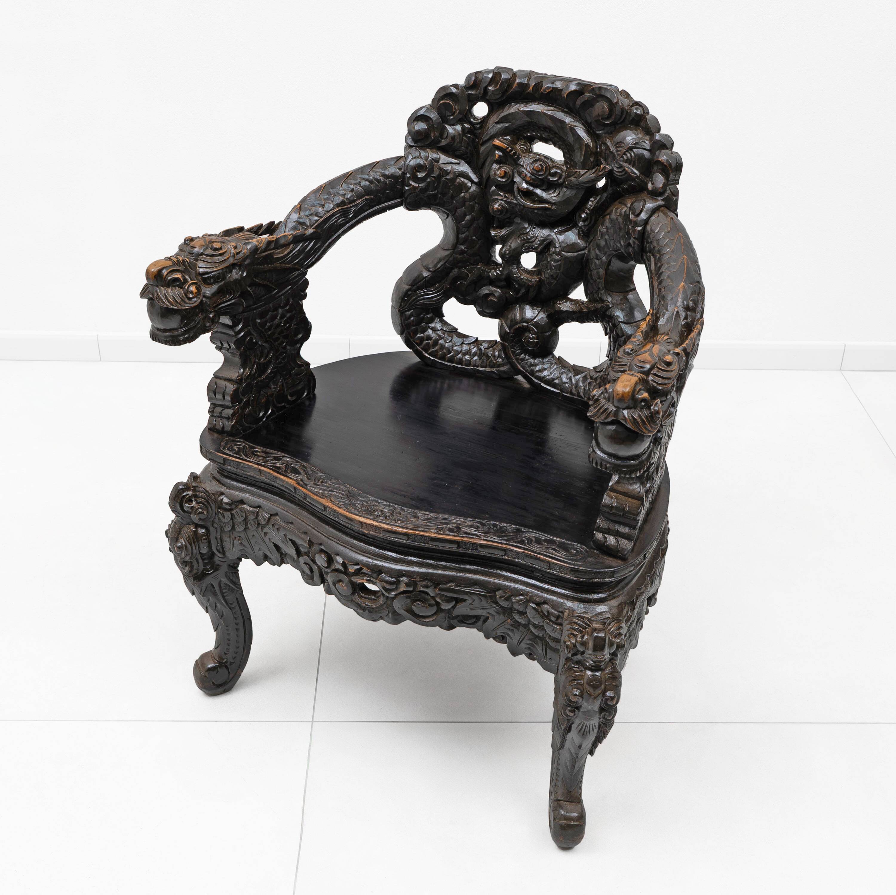 Pair of Chinese Qing Dynasty Carved Dragon Armchairs,Ebonized Hardwood,19th