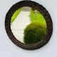 Vintage sun mirror in woven wicker