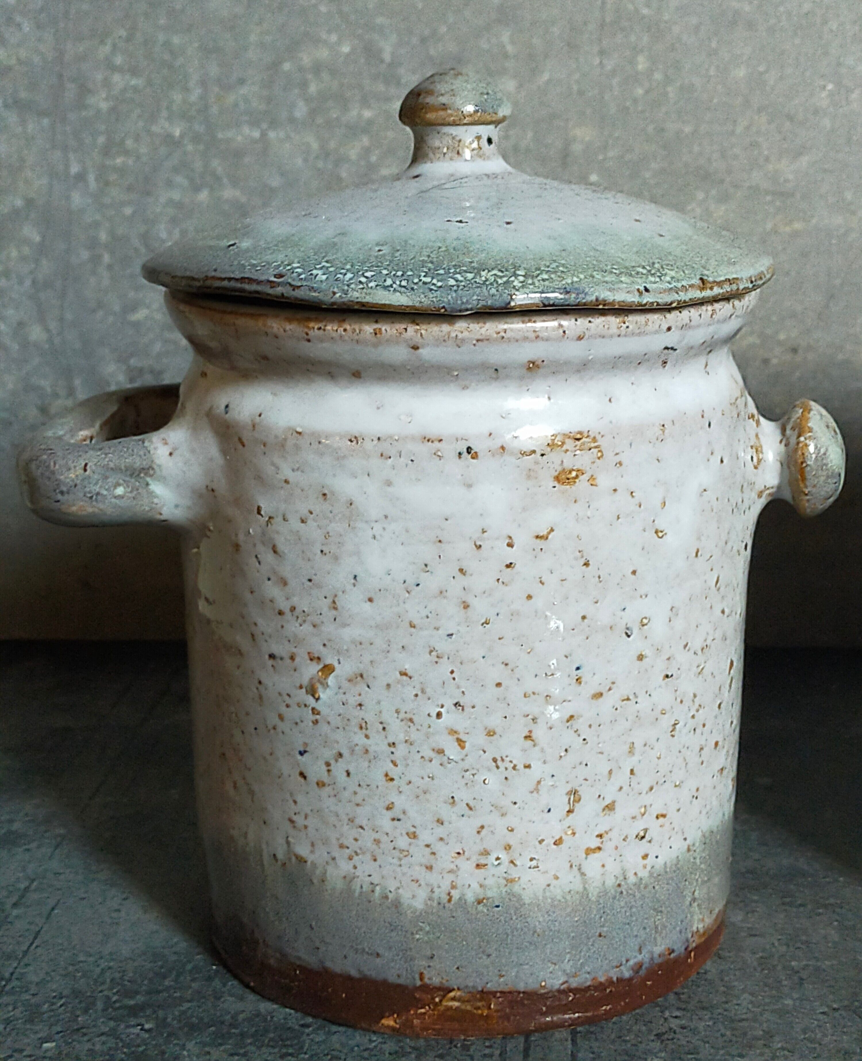 Duo of potter's pots covered in vintage glazed stoneware