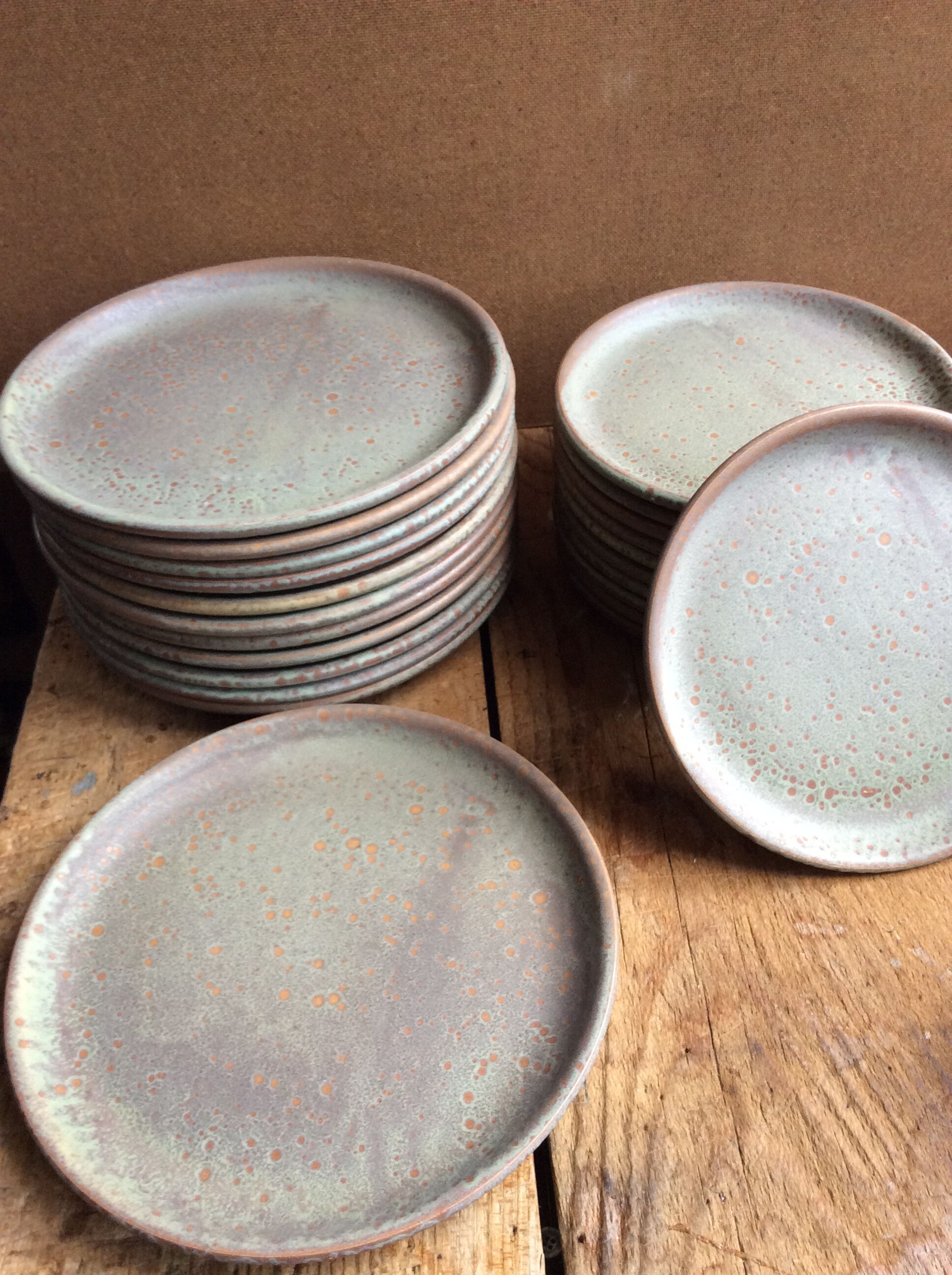 Set of 12 large and 11 small sandstone plates