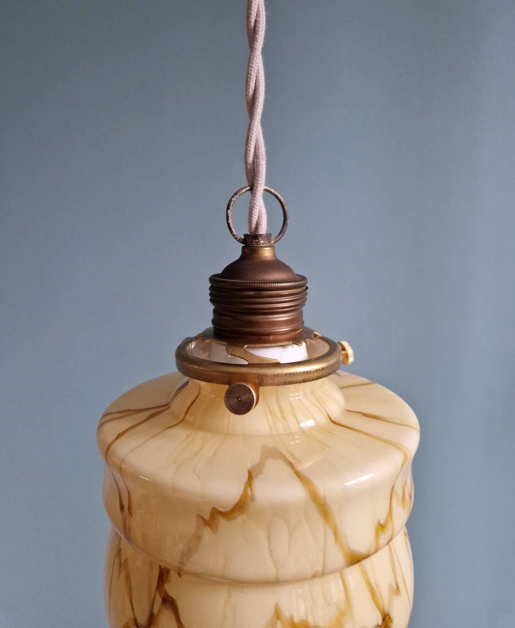 Art Deco trio of suspensions in opaline and marbled ouraline, Scailmont, 1920-30.