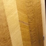 French wardrobe with tapered legs, 3 doors, 1 mirror (27*130), and 1 drawer.