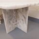 Pair of vintage nesting coffee tables in white marble from the 1970s.