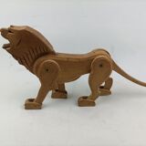 Articulated wooden lion