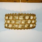 Suspension rattan and palm leaves chic jungle style
