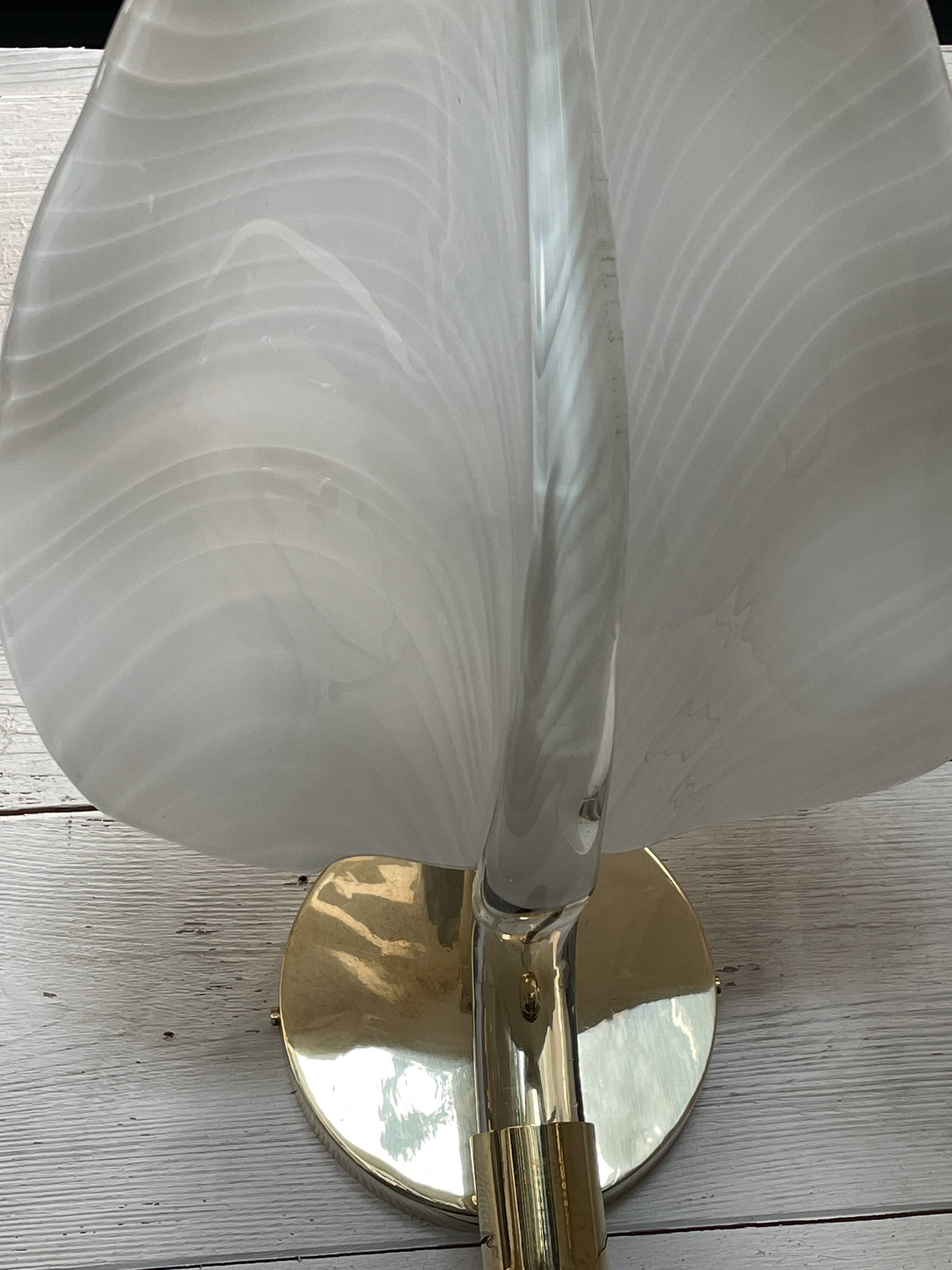 Set of 3 Murano glass wall lamps in white and brass, 1970s.