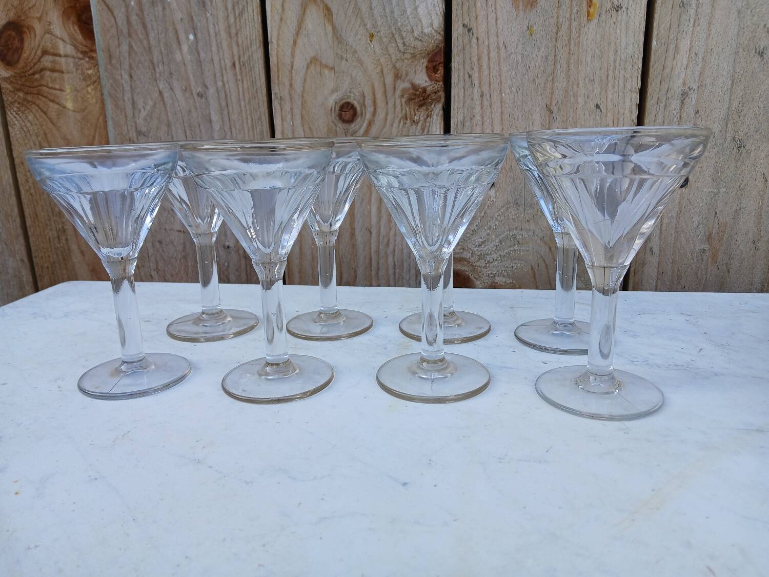 Set of 8 very thick antique stemmed glasses.
