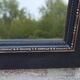 Vintage black and gold wooden mirror with a pediment – Napoléon III style