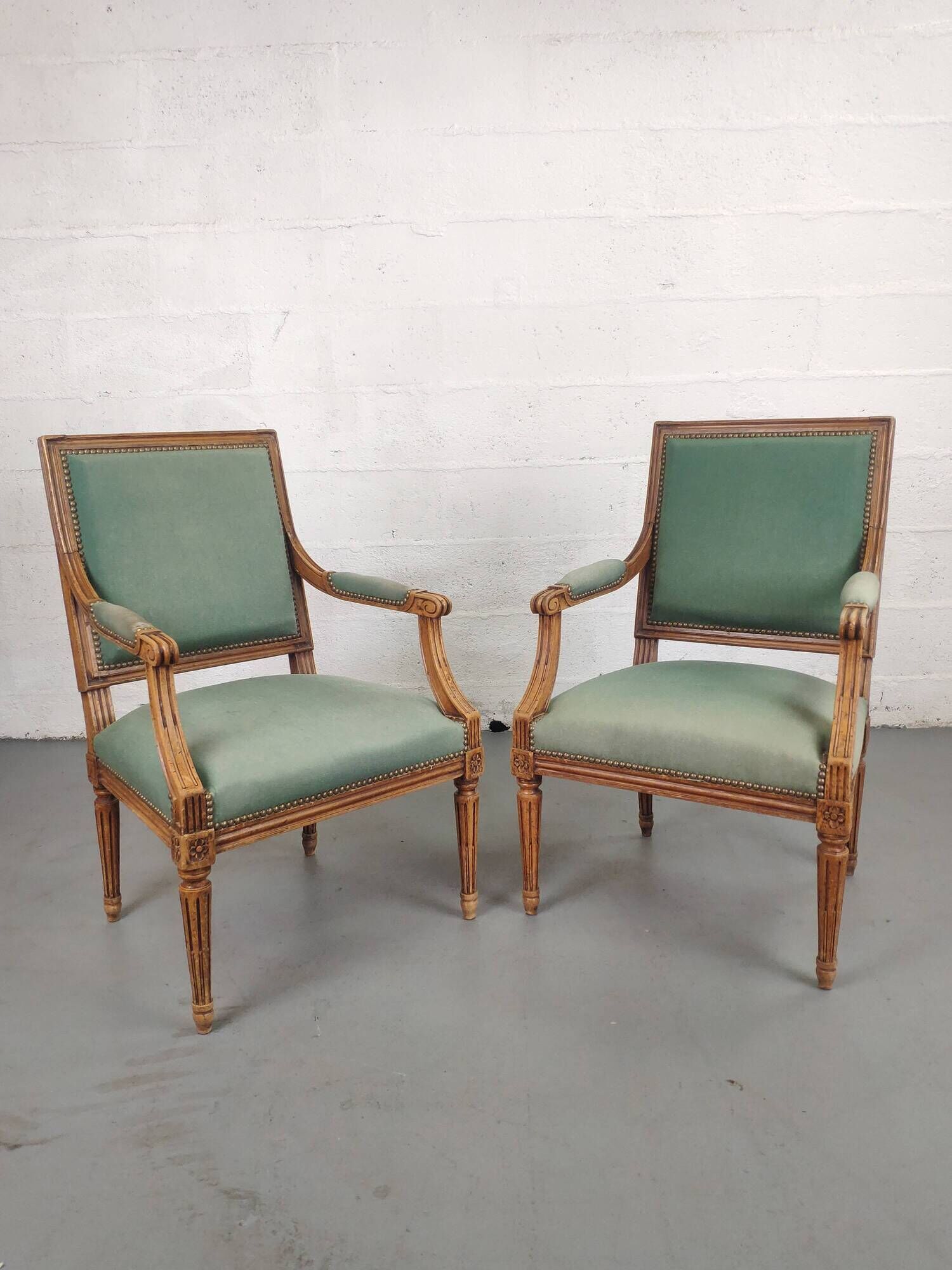 Pair of Louis XVI armchairs upholstered green velvet