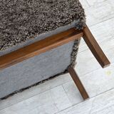 1960s, reupholstered Danish armchair, with stool, genuine sheepskin.
