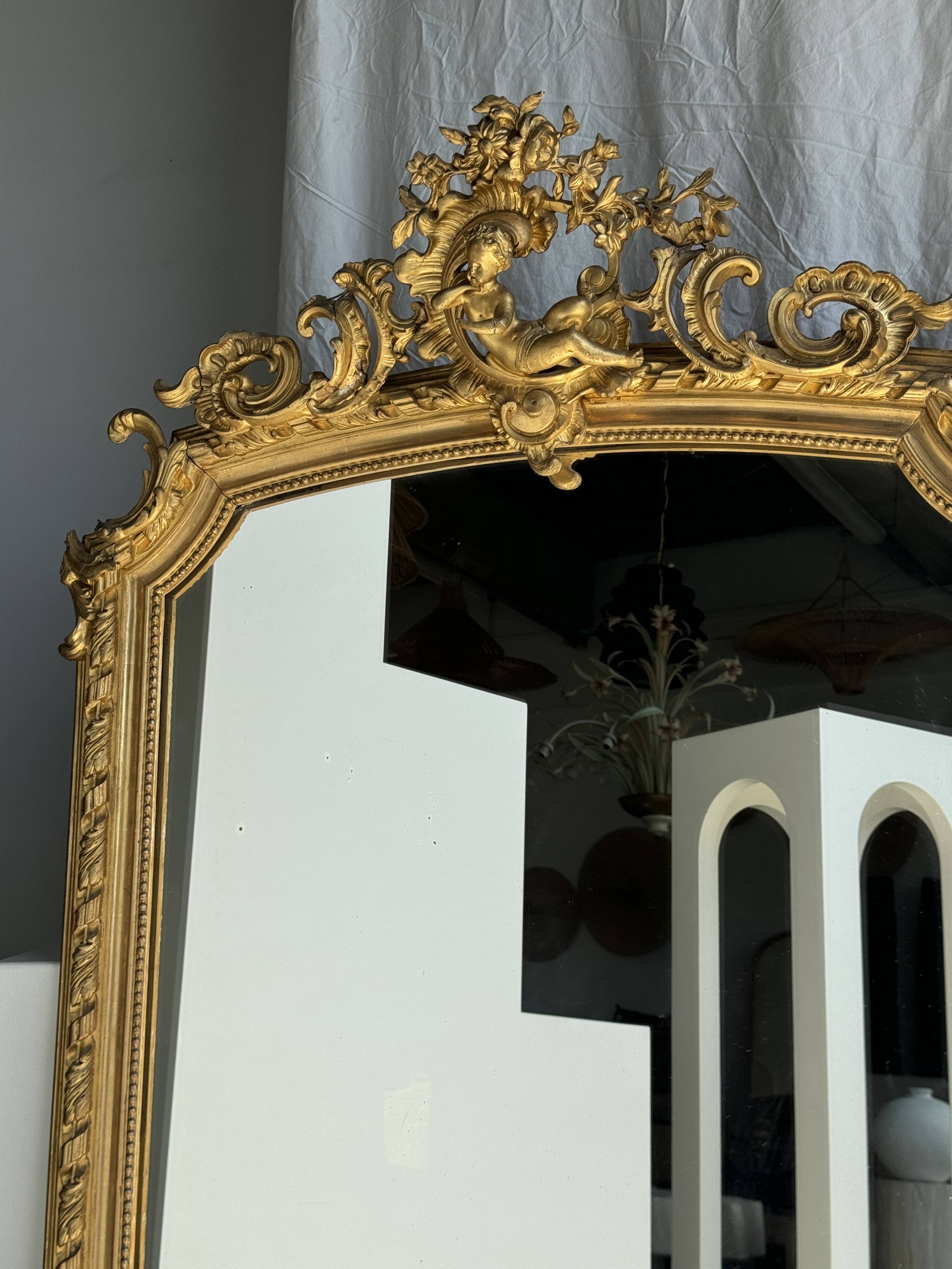 Large gilded mirror with acanthus leaf pediment H150 L98