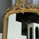 Large gilded mirror with acanthus leaf pediment H150 L98
