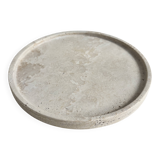 Circular flat travertine pocket emptier