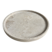 Circular flat travertine pocket emptier