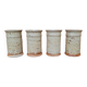 Set of four glasses in varnished stoneware
