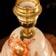 Spanish porcelain lamp hand-painted with floral patterns.