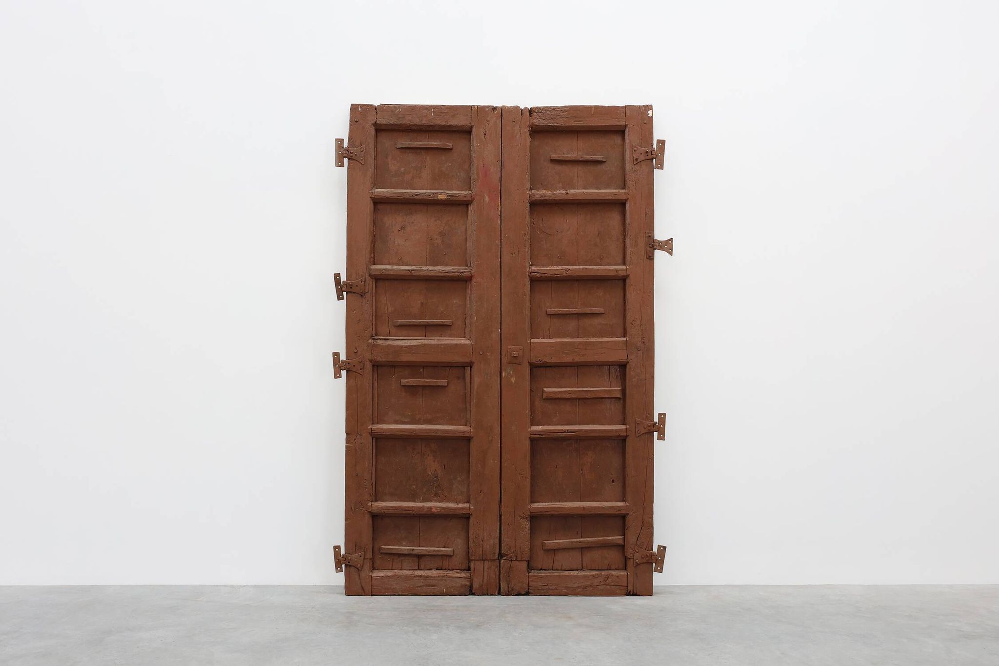 Large 17th century Monastery doors in terracotta lacquered oak, Portugal