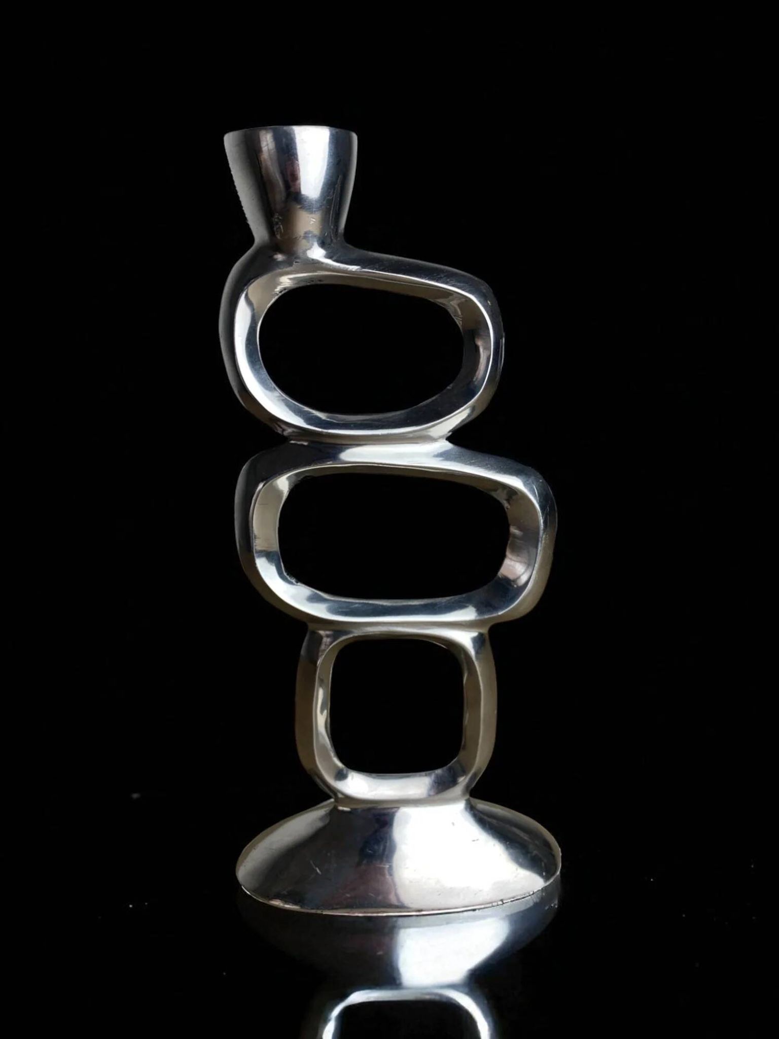 Circle candlestick by Matthew Hilton, aluminium, 1980s