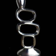 Circle candlestick by Matthew Hilton, aluminium, 1980s