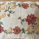 Large hand-embroidered linen cushion.