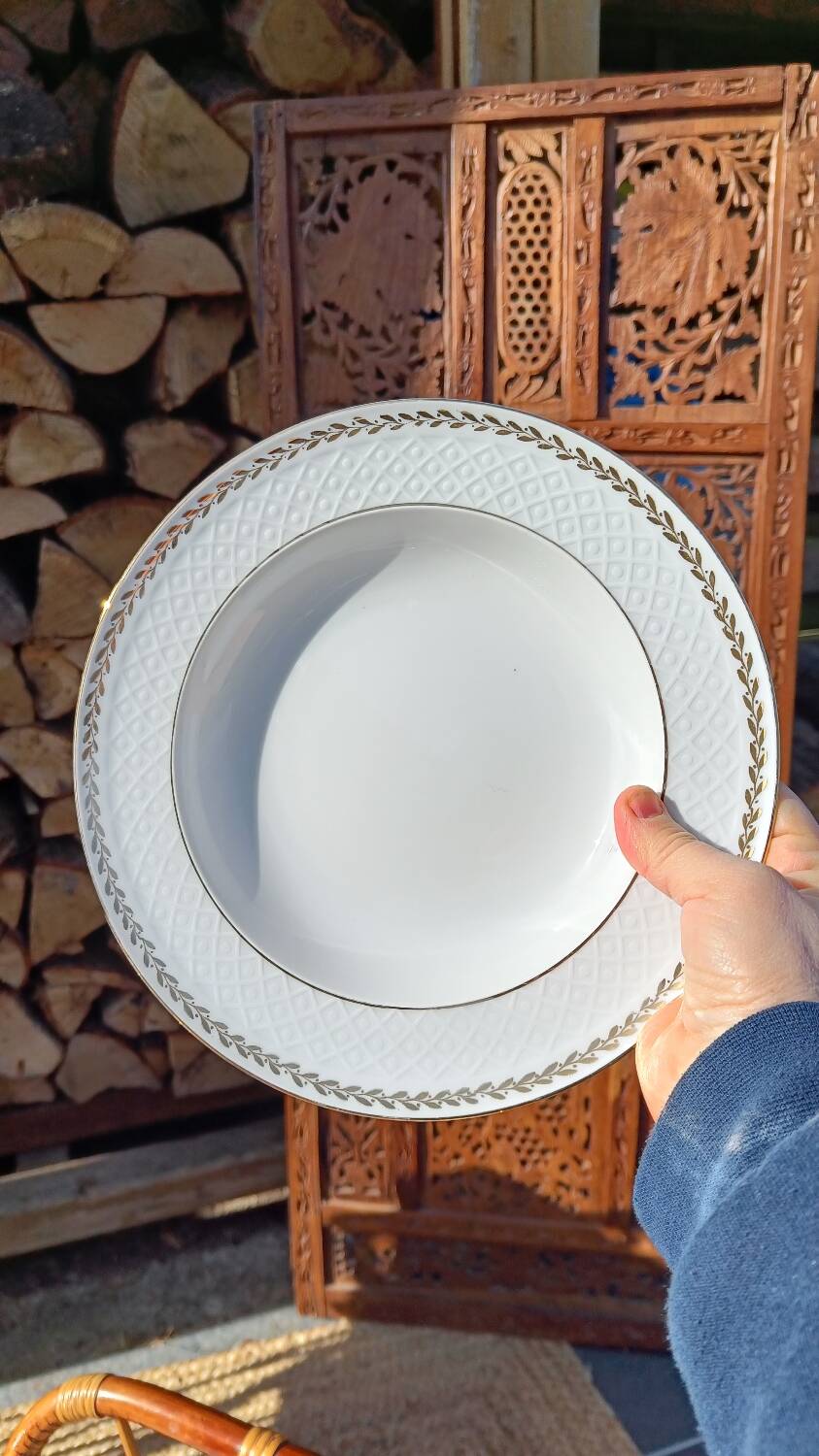 Twelve white porcelain plates