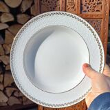 Twelve white porcelain plates
