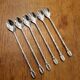 6 long silver-plated metal spoons
