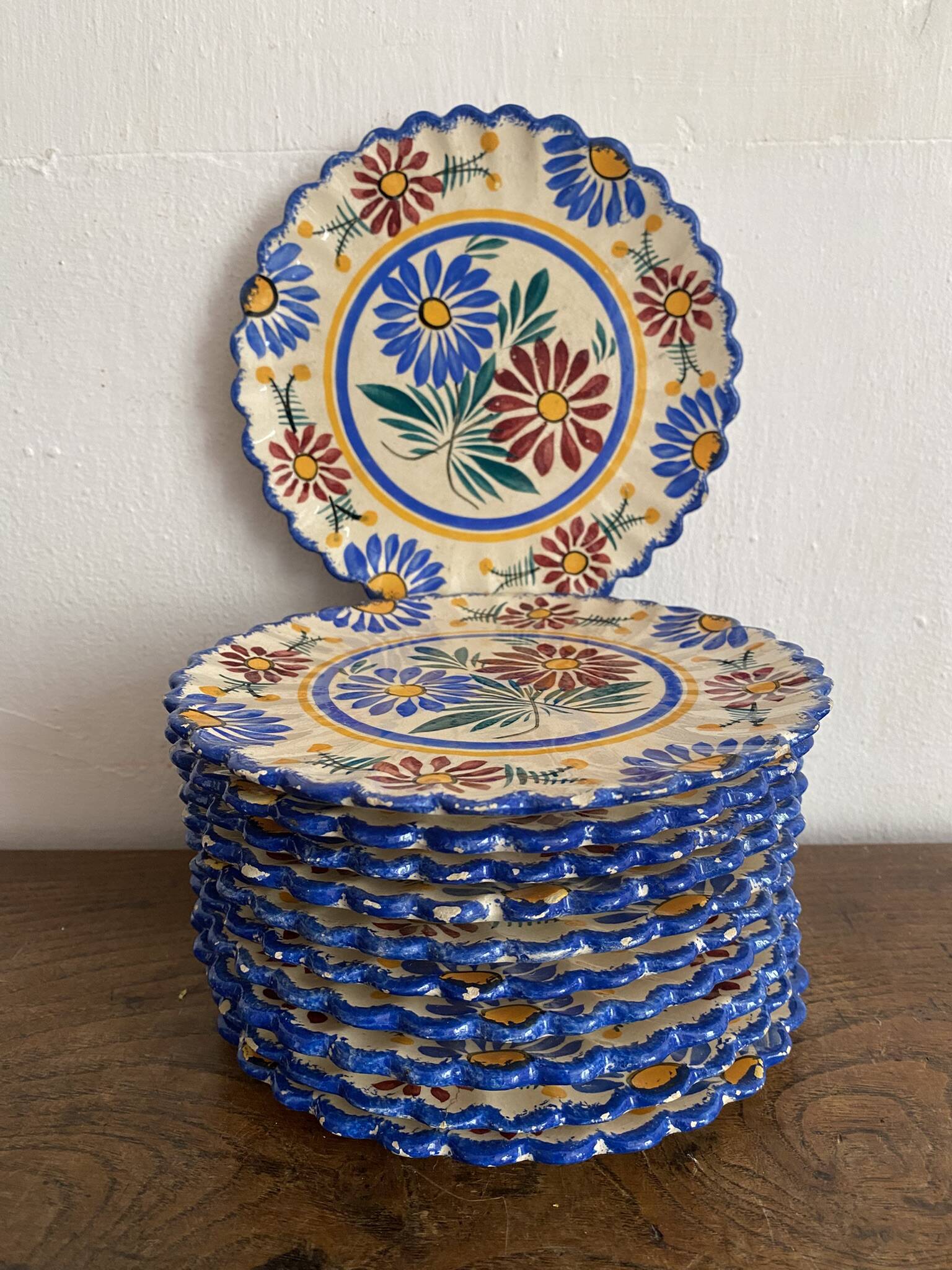 Henriot Quimper dessert plates, hand-painted earthenware.
