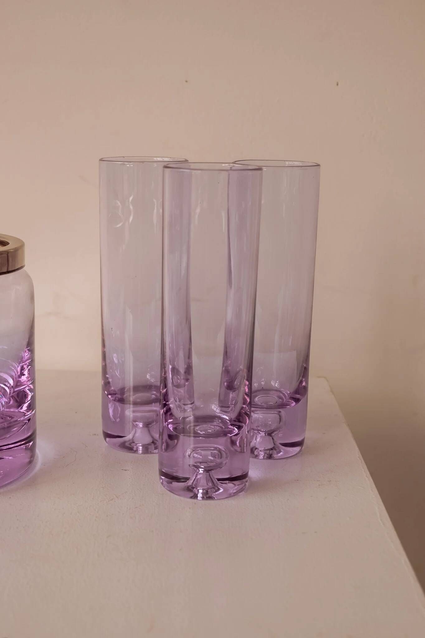 Set of lilac alexandrite liqueur glasses with matching ice bucket.