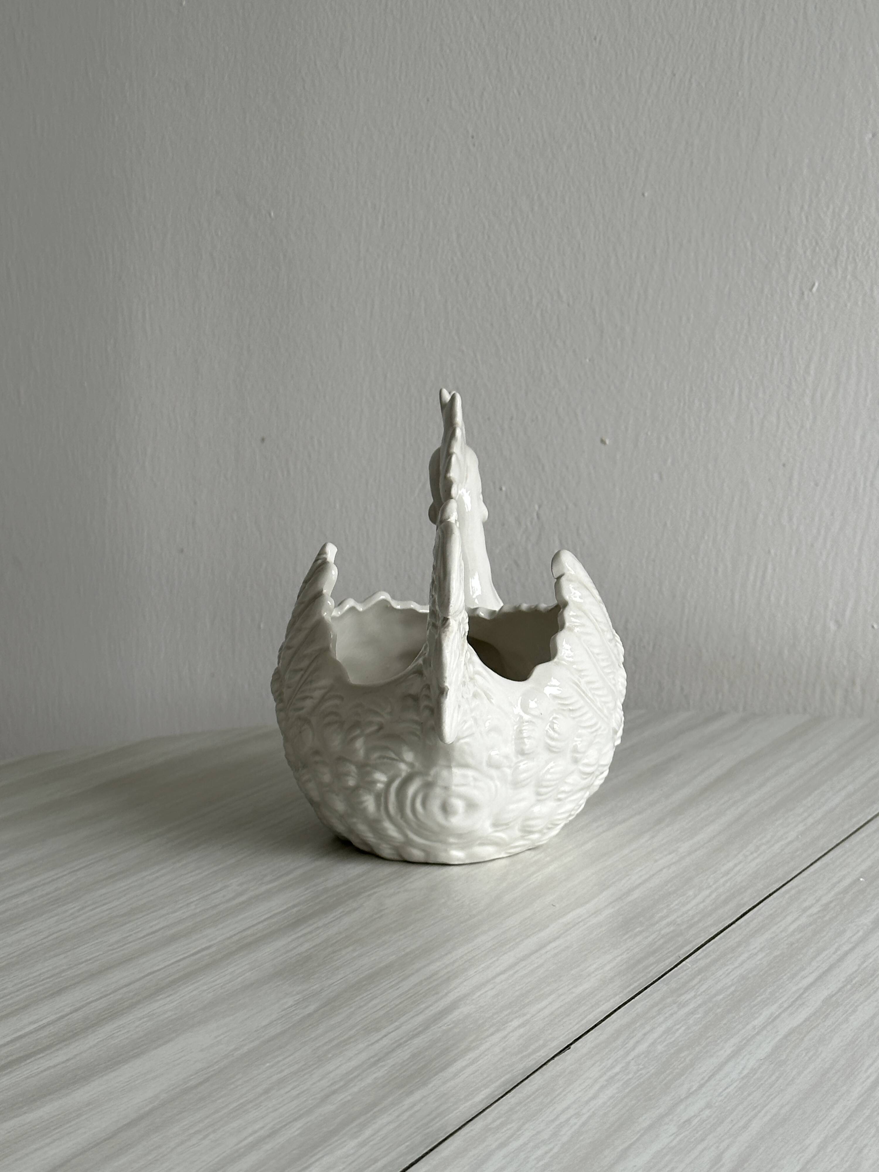 White ceramic egg basket