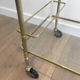 Neoclassical brass rolling table with double glass tops
