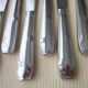 Box of 12 one-piece stainless steel table knives