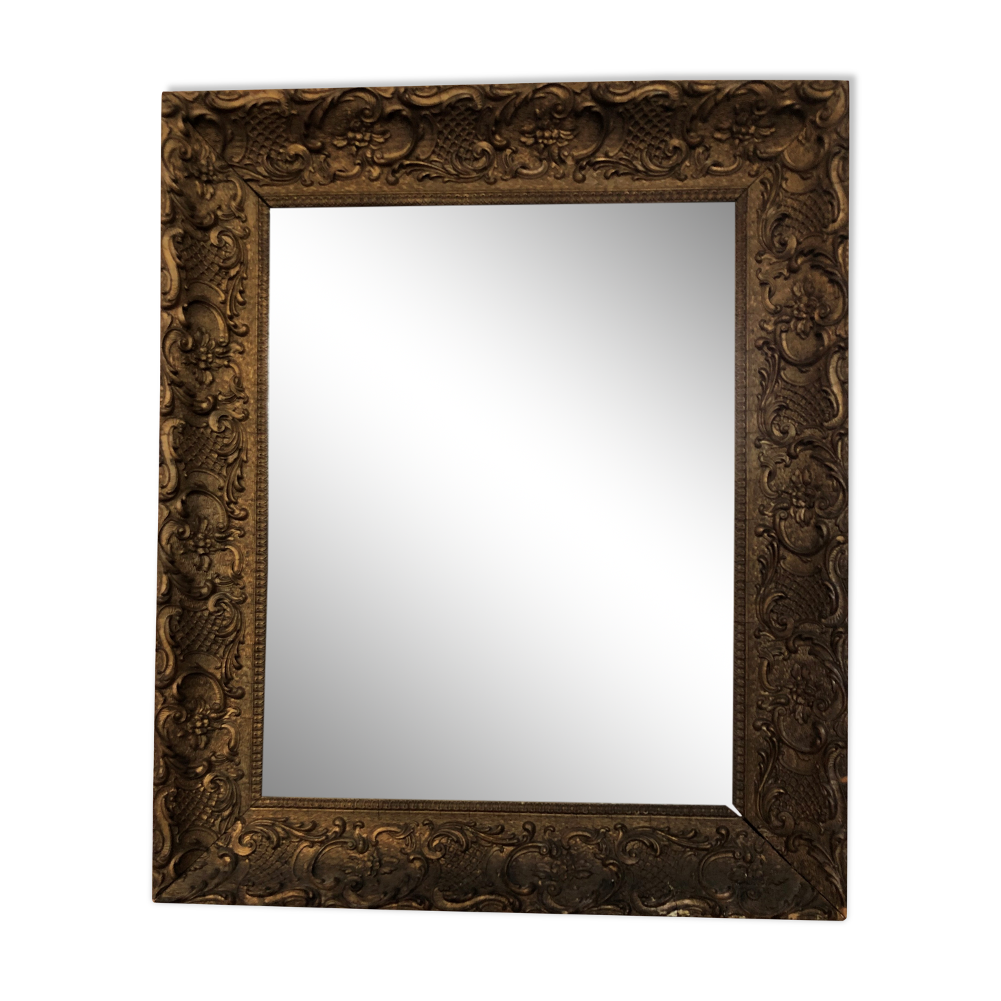 Carved and gilded wooden mirror