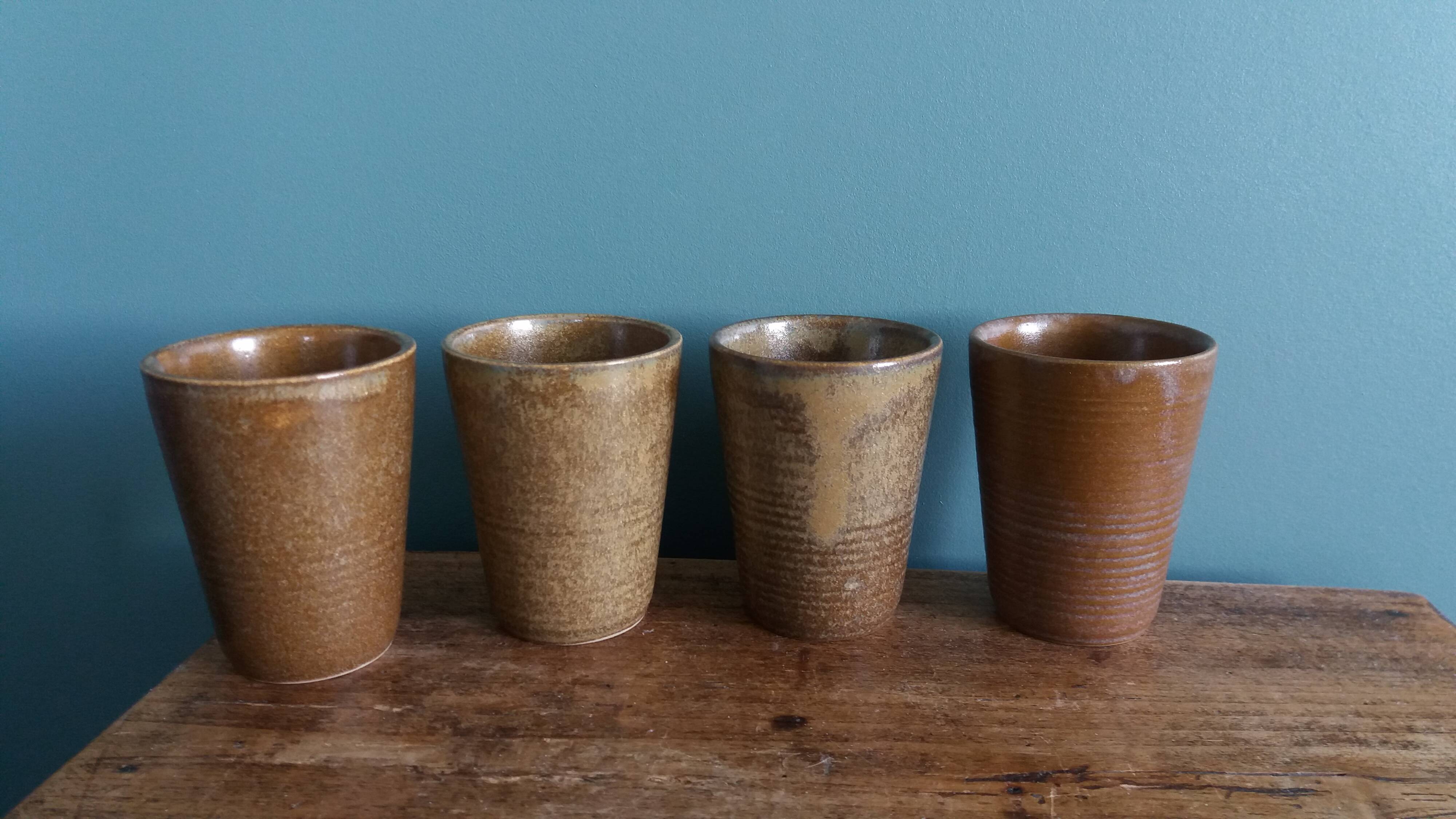 Digoin stoneware mugs, glasses, and cups.