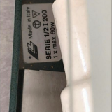 Wall lamp in green and bronze glass and metal made in Italy