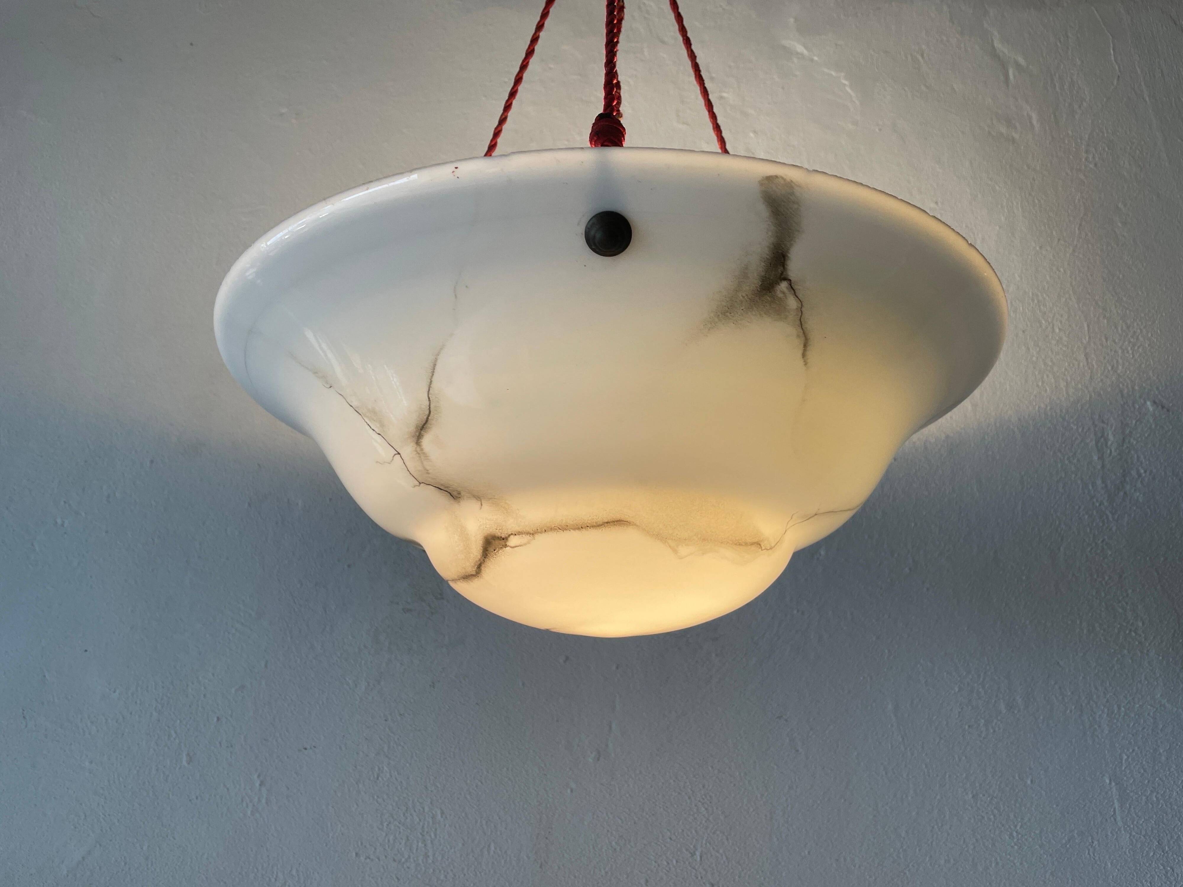 Art Deco suspended lamp in white marble-effect glass, 1940s, Germany.