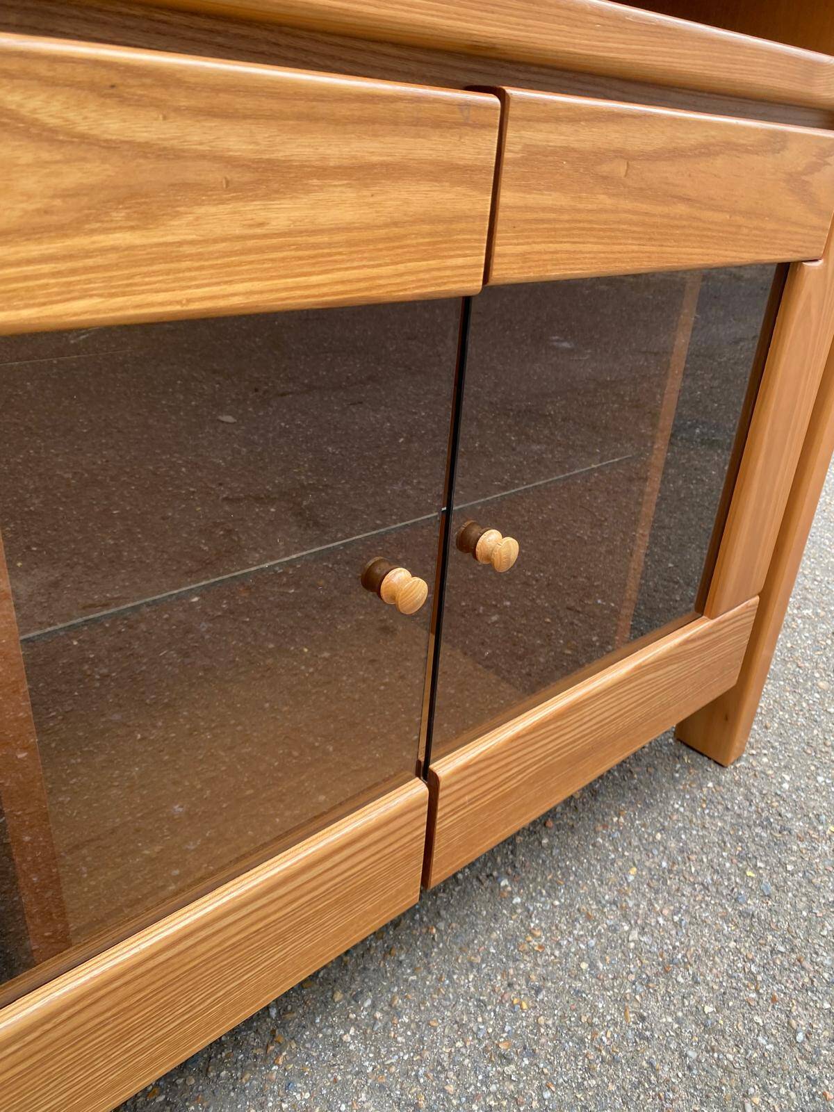 Glass-fronted Scandinavian oak sideboard from the 1980s.