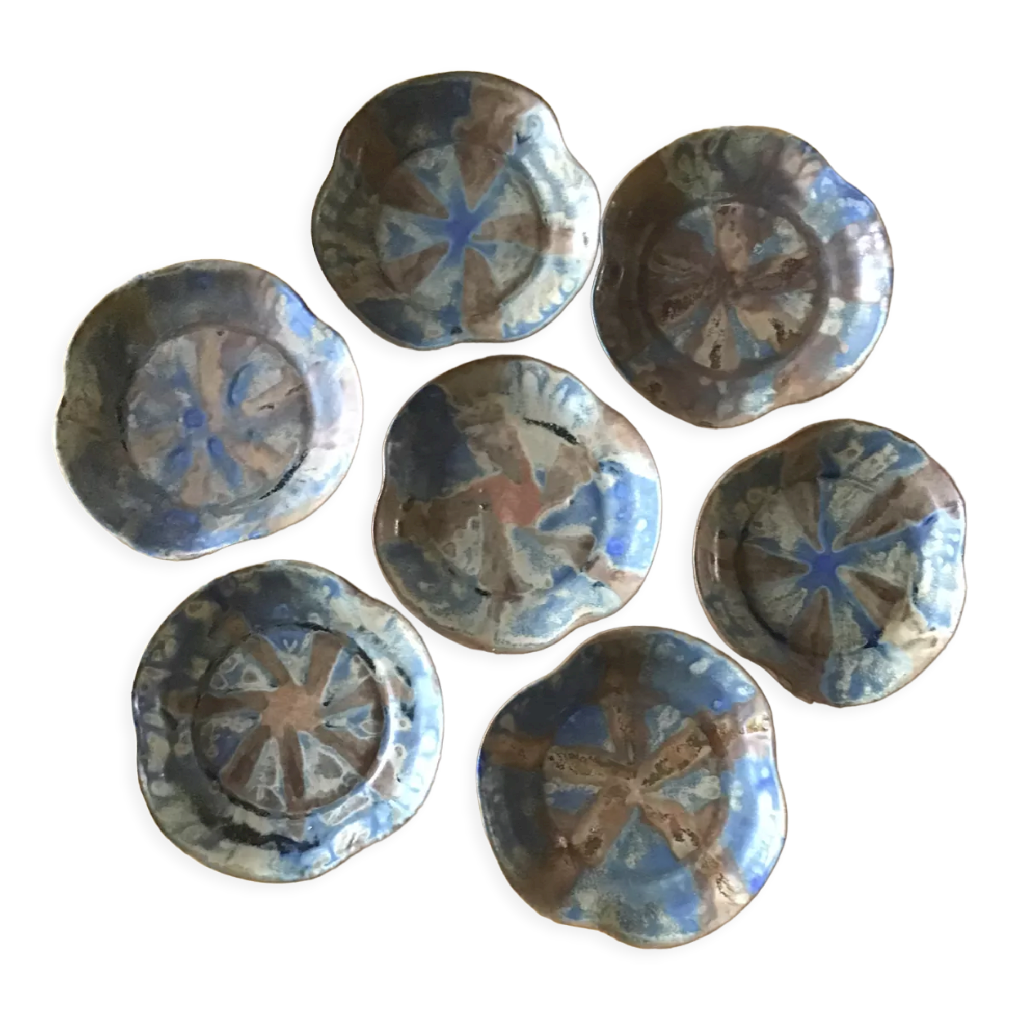 7 stoneware cups signed G Méténier