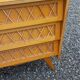 Vintage chest of drawers in light oak and rattan with tapered legs, 3 drawers from the 1950s.