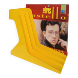 Yellow plastic vinyl racks from the 70s